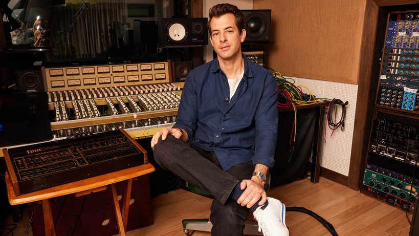 Image of Mark Ronson sat in his music production studio.